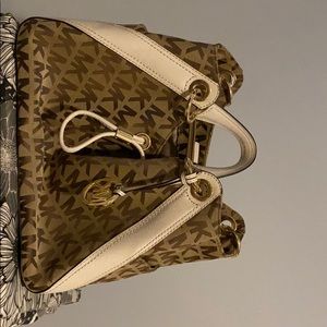 Micheal Korrs brown monogrammed handbag